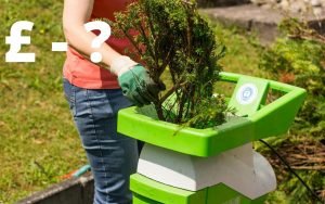 Are Garden Shredders Worth it - picture of woman using a shredder